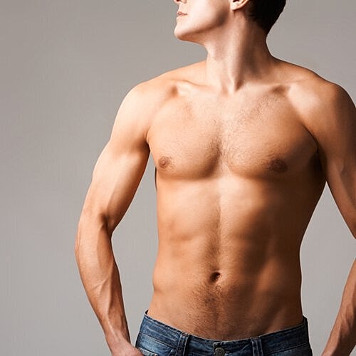Man preparing for summer after laser hair removal treatments.