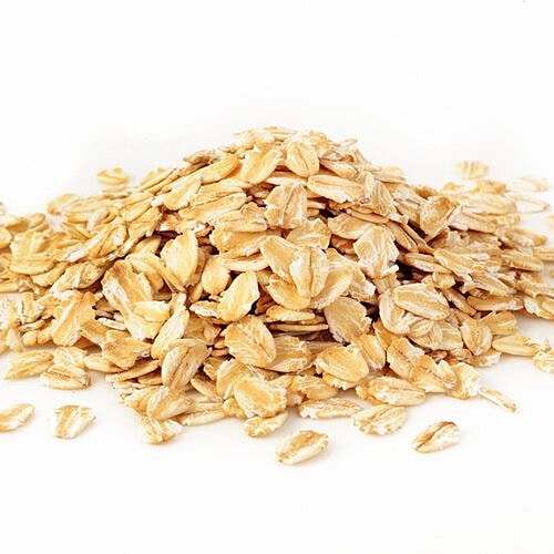 Bowl of whole grains and fresh produce for anti-aging nutrition.