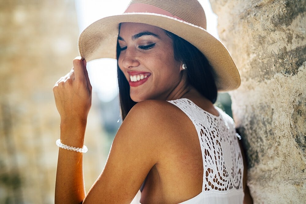 Long Island rhinoplasty model smiling