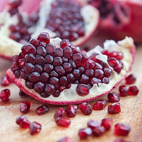 Breakfast with pomegranate juice for glowing skin.