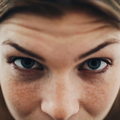 College-bound student smiling after rhinoplasty