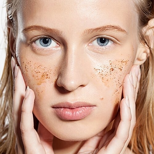 Woman considering post-holiday cosmetic treatments.