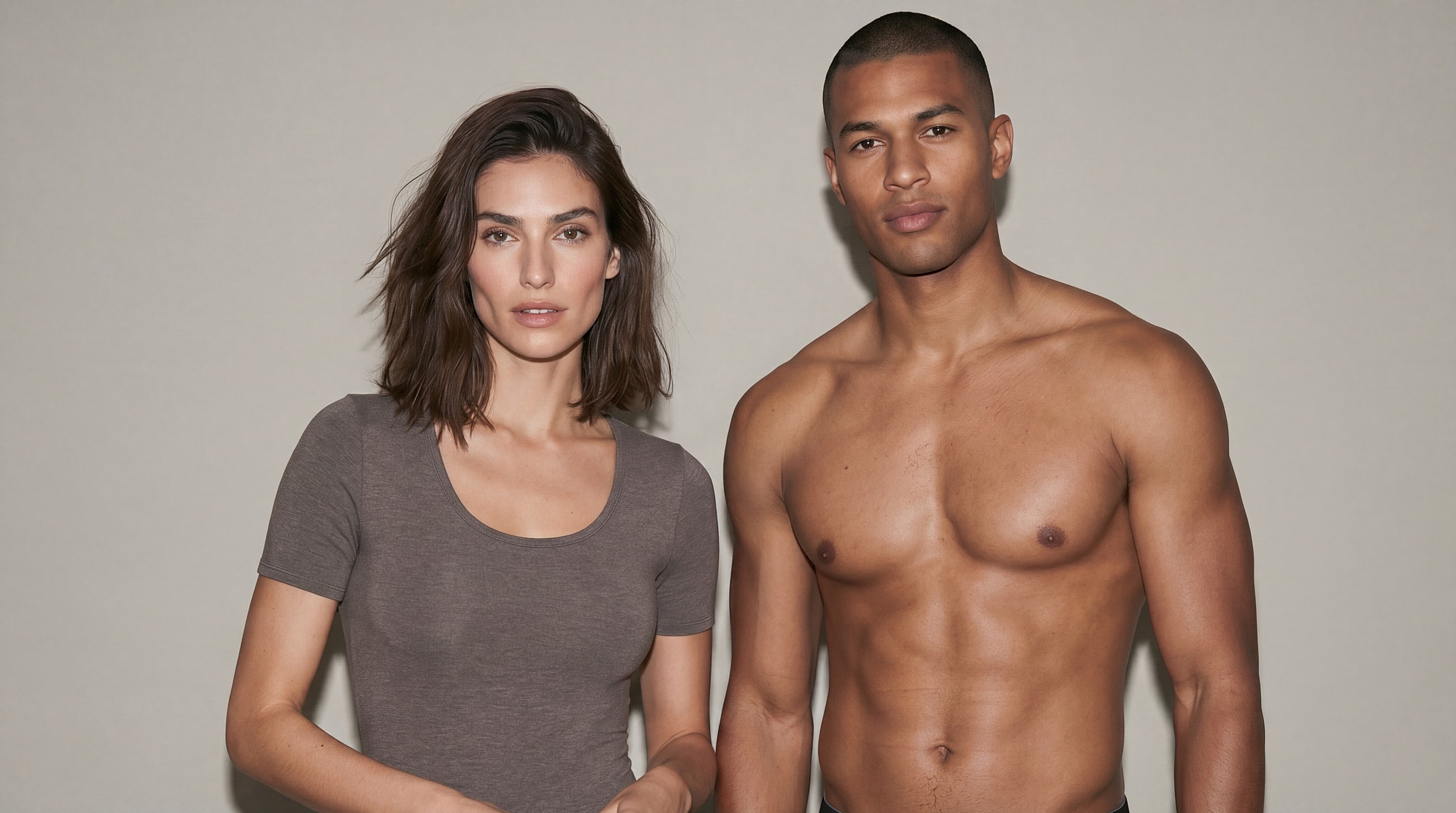Fashionable models posing against a neutral background.
