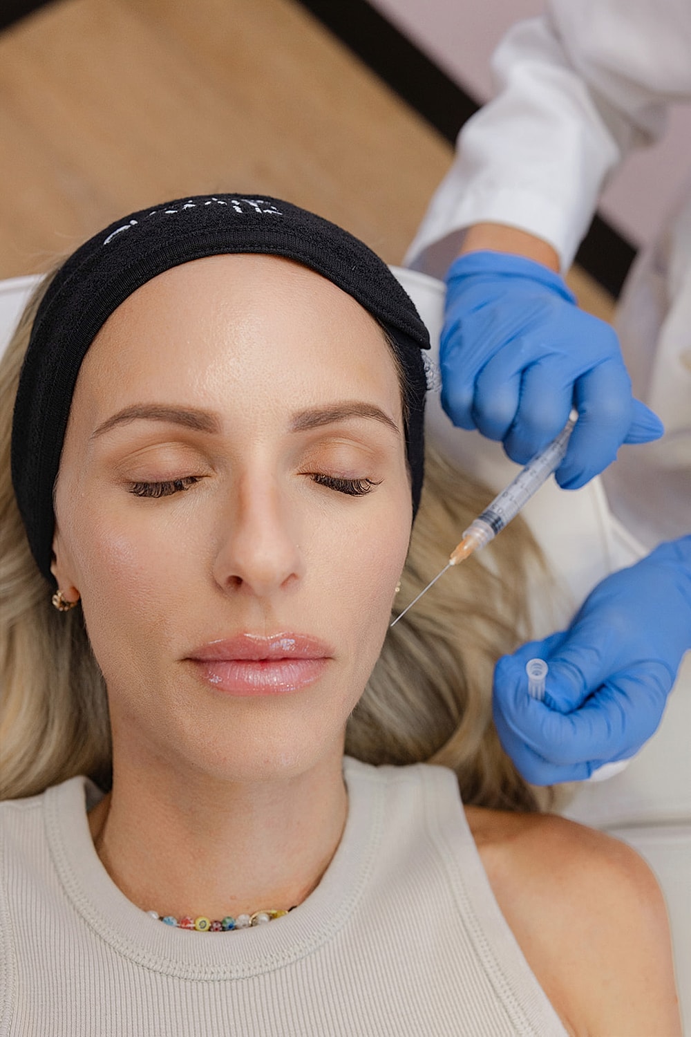 Patient receiving cosmetic injection treatment.