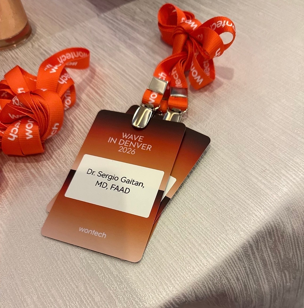 Conference badges for Dr. Sergio Gaitan in Denver for the 2026 AAD