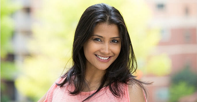 woman smiling after botox treatment