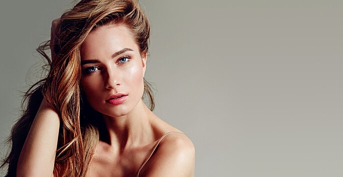 Woman smiling after Juvéderm filler treatment