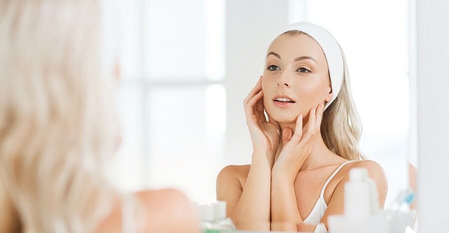 woman smiling after morpheus8 skin tightening treatment