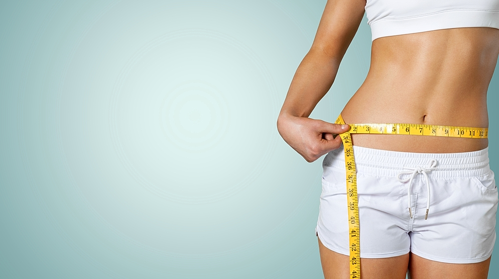 patient receiving CoolSculpting applicator on abdomen