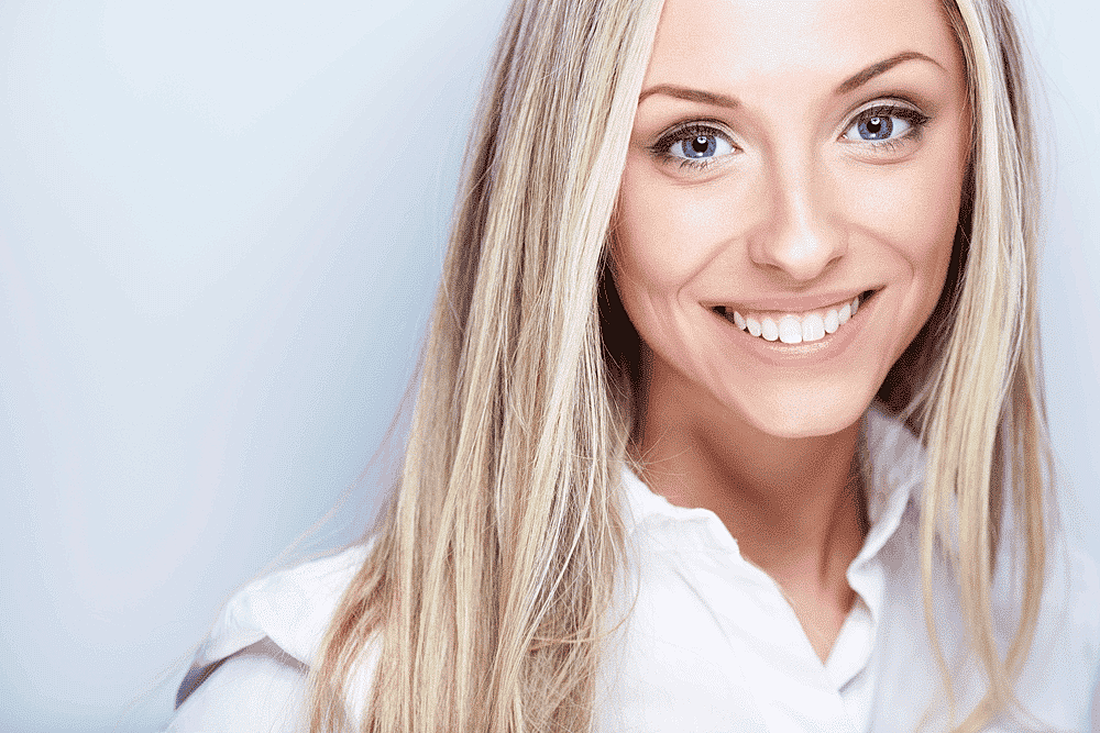 woman smiling after RHA filler treatment