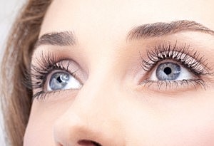 woman showing longer eyelashes after Latisse