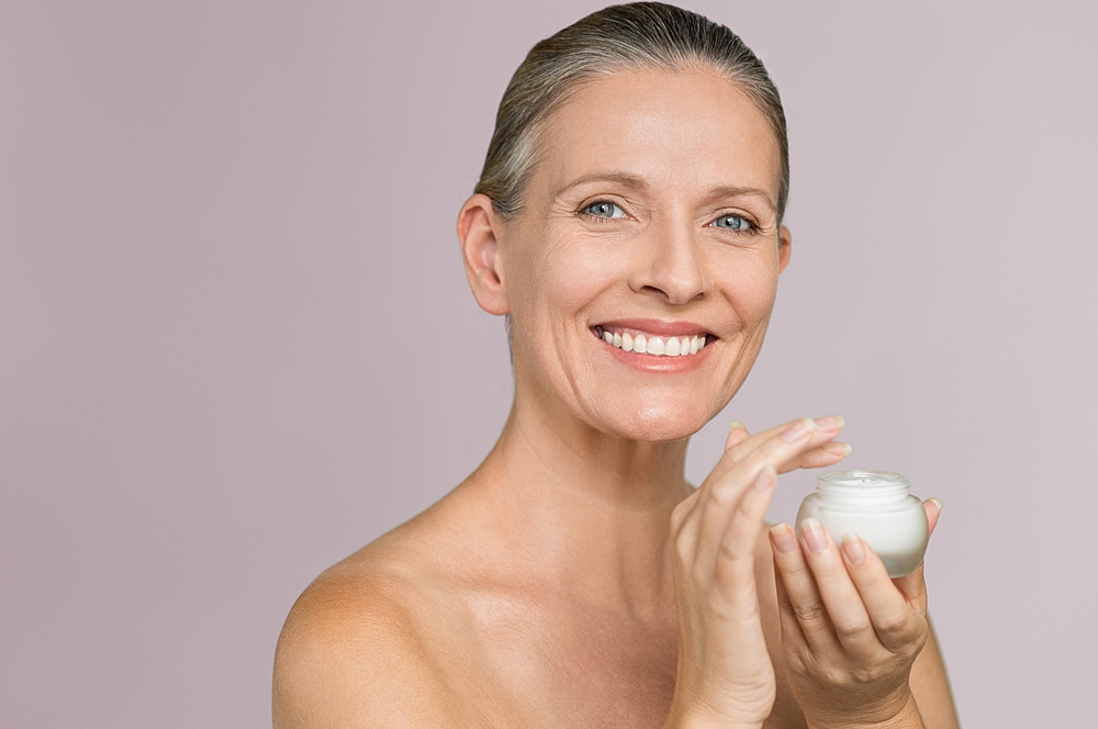 woman touching forehead considering botox treatment areas