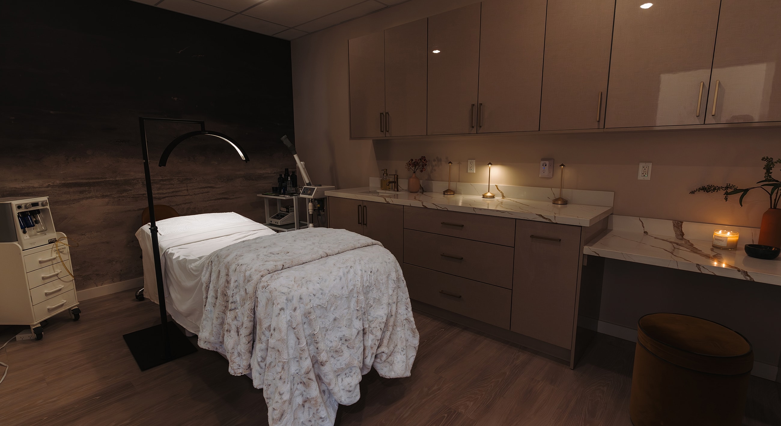 Modern aesthetic skincare treatment room interior design.