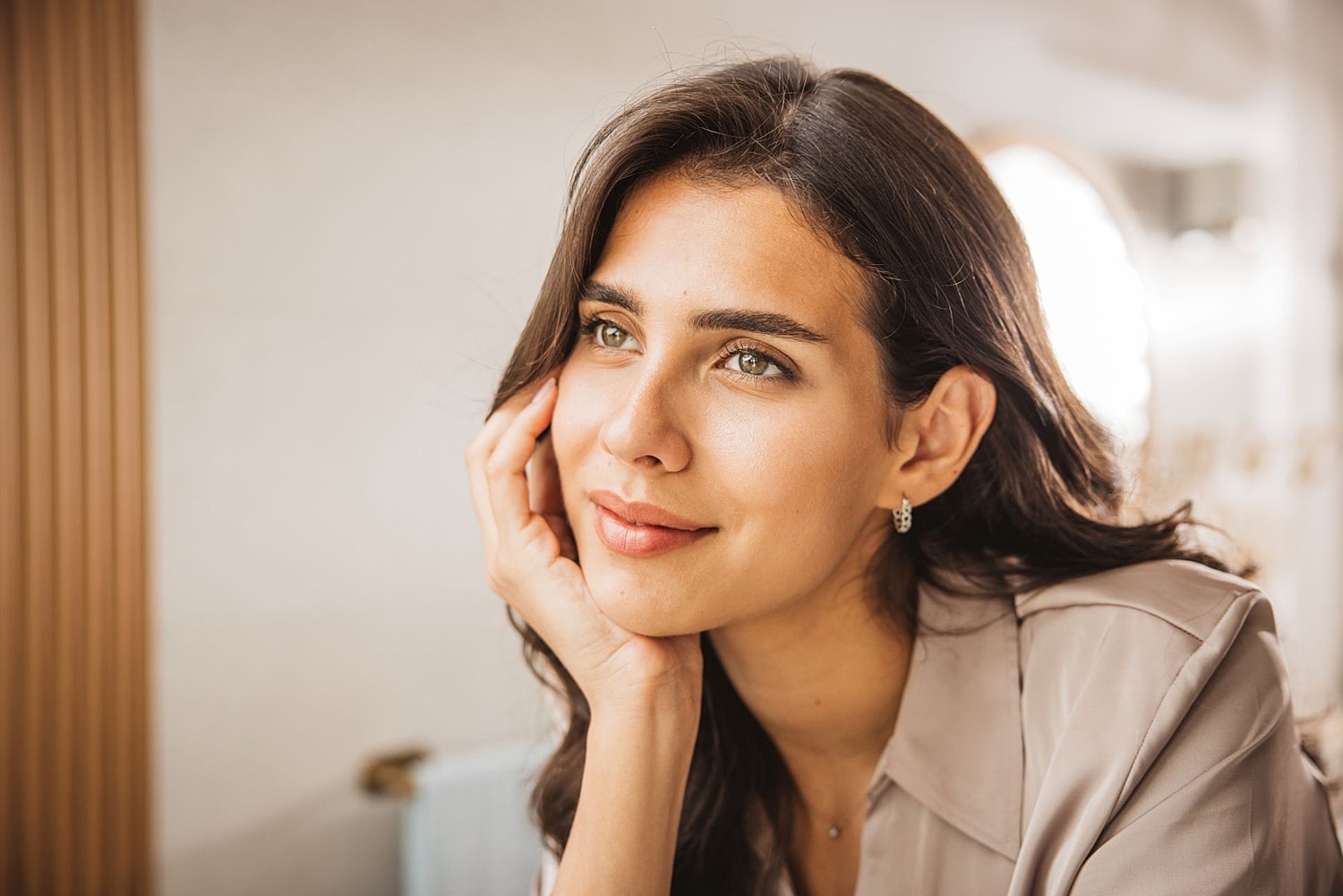 A woman with a youthful appearance and firm skin structure, showcasing the natural-looking results of combined microneedling and radiofrequency energy.