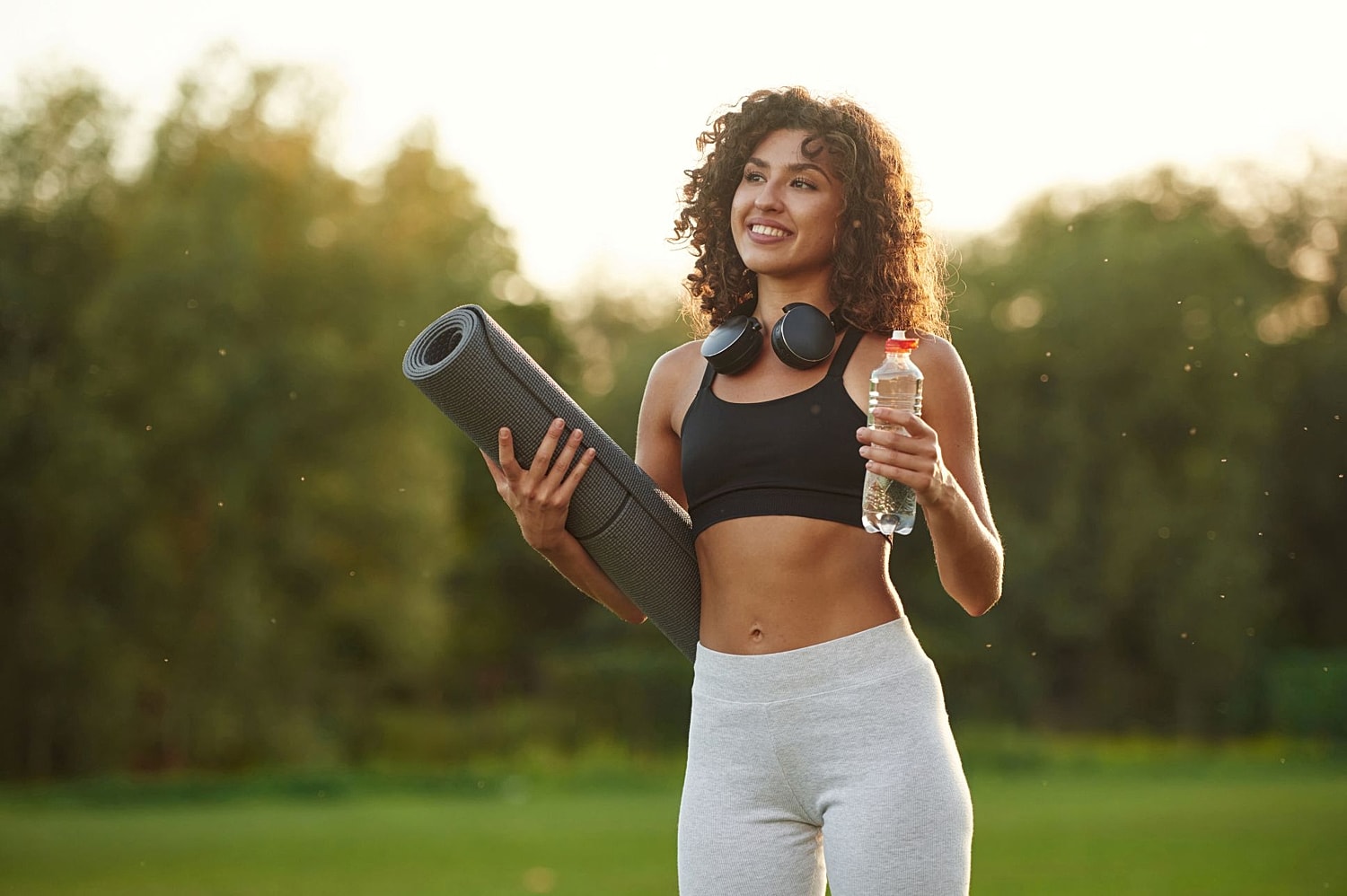 A close-up of a toned abdomen showing the results of high-intensity focused Emsculpt NEO and muscle remodeling.