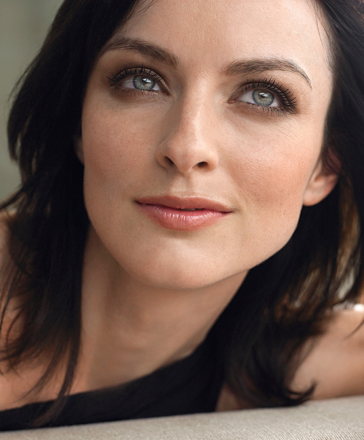 St. Louis injectables model with dark hair.