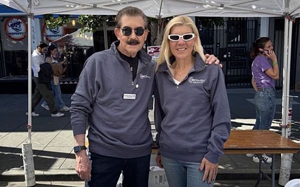Dr. Christo Zouves and Dr. Kay Waud attend the Castro Street Fair.