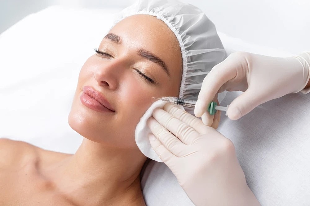 Med spa Dysport treatment applied to a woman’s cheek.