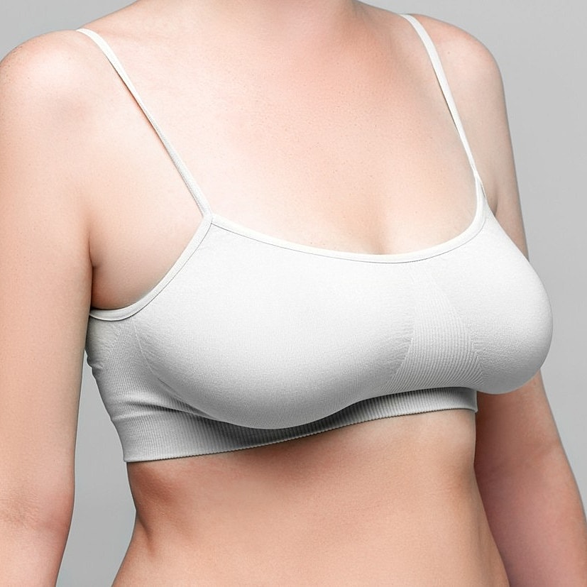 White sporty bralette on a model.