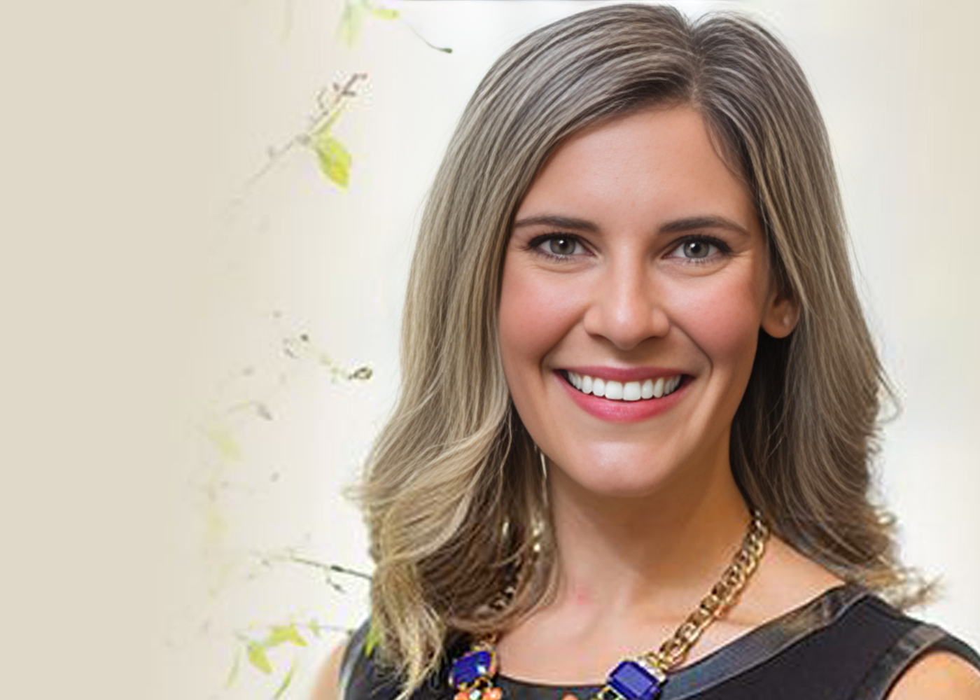 Smiling woman wearing a colorful necklace