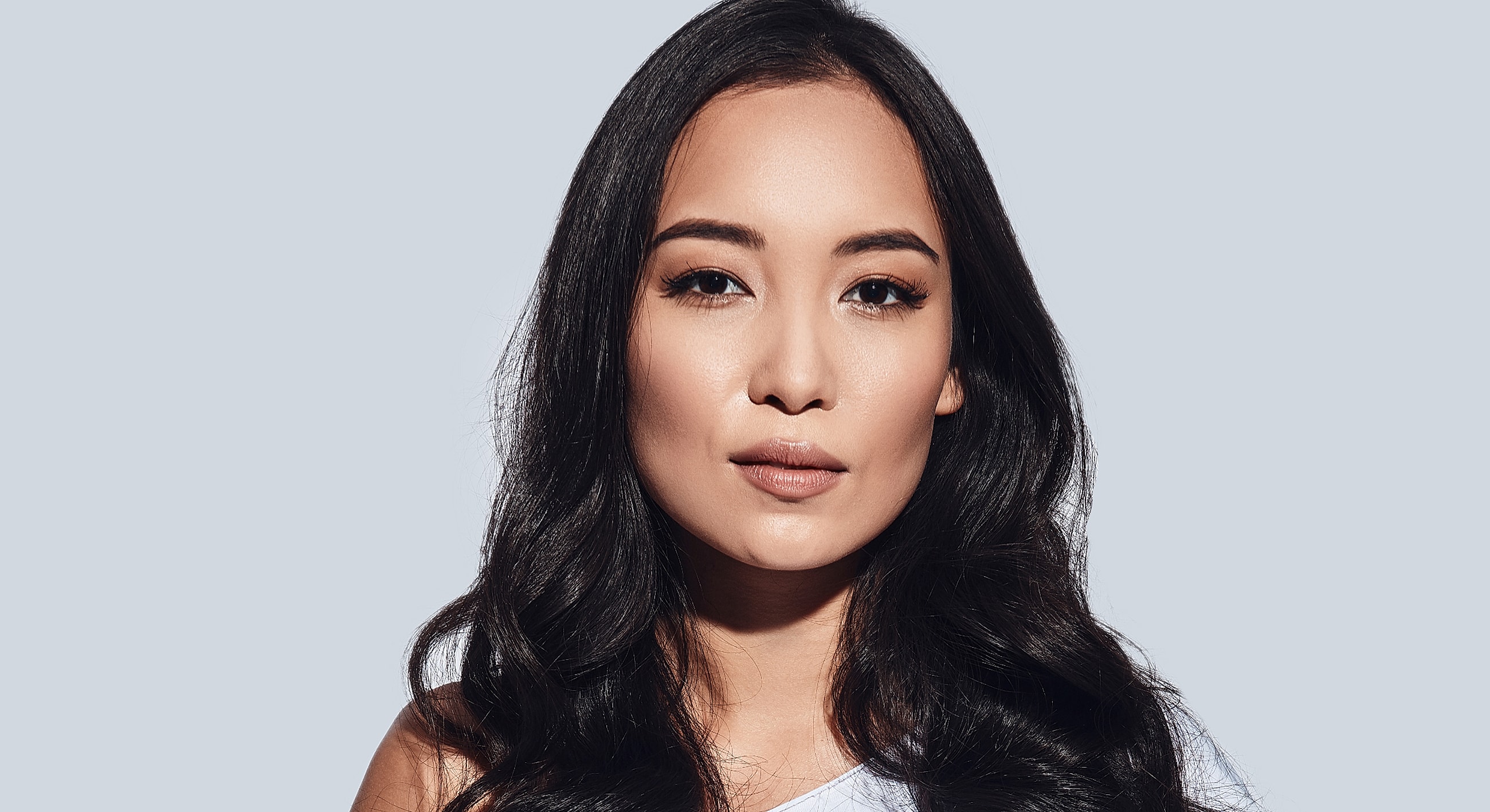 Portrait of a woman with long, dark hair.