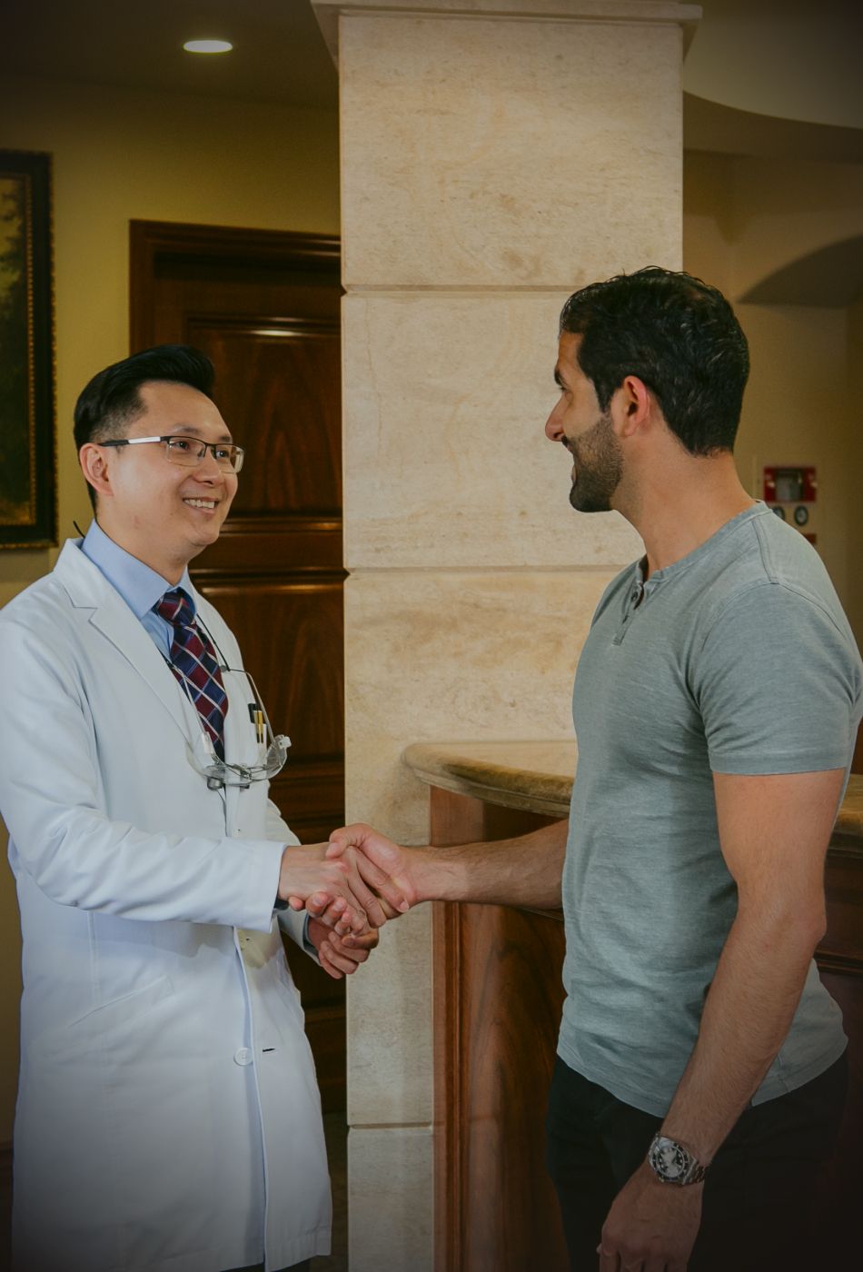 Newport beach dentist - Dr. Chau with patient