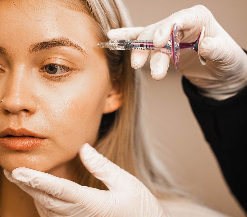 Cosmetic procedure focusing on facial enhancement.