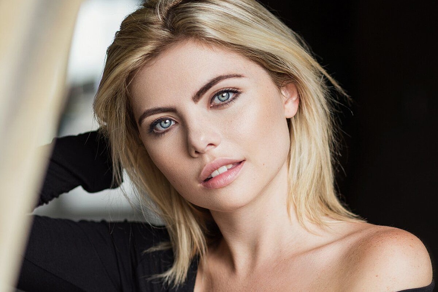 The T-Z Plasty Technique blonde model looking at camera