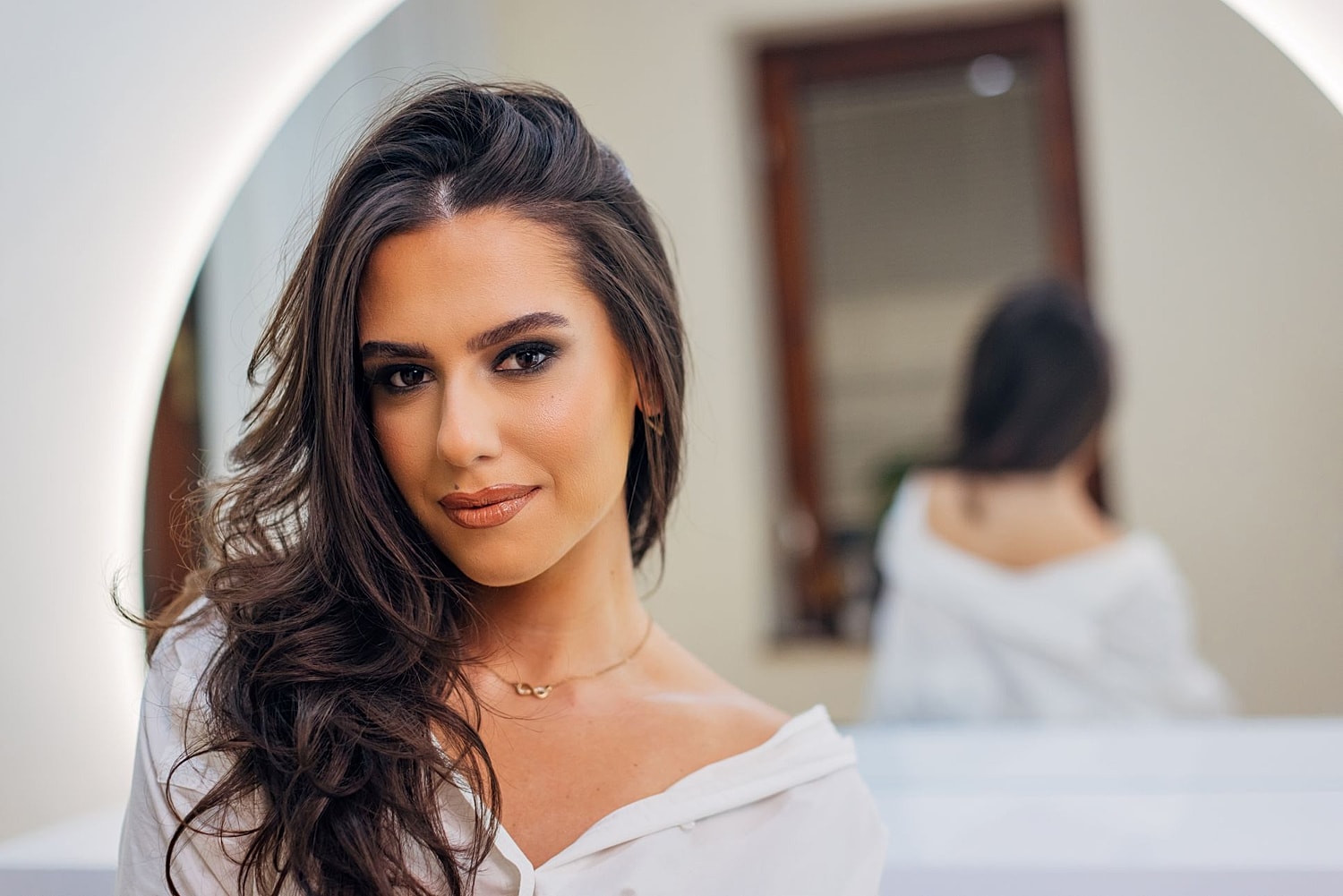 Woman with softly defined facial features, illustrating natural-looking facial rejuvenation and refreshed results.