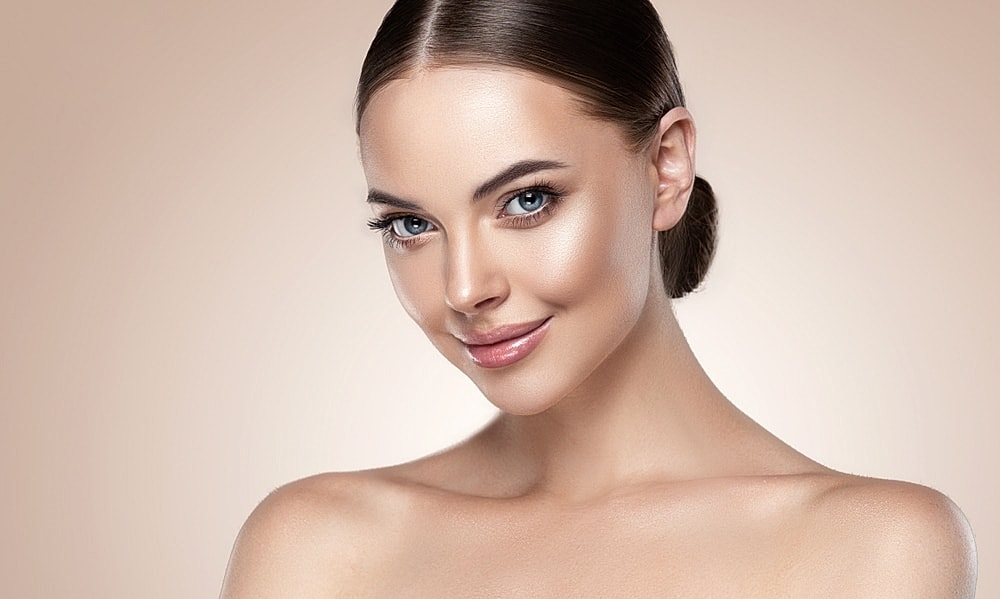 Beautiful young woman with elongated neck and shoulders after getting Barbie BOTOX at Miami Skin & Vein