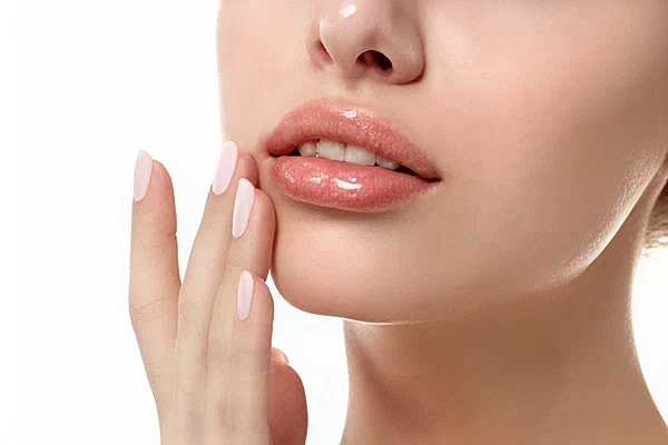 Woman with soft, beautiful lips after getting Restylane Kysse treatment from Miami Skin & Vein.