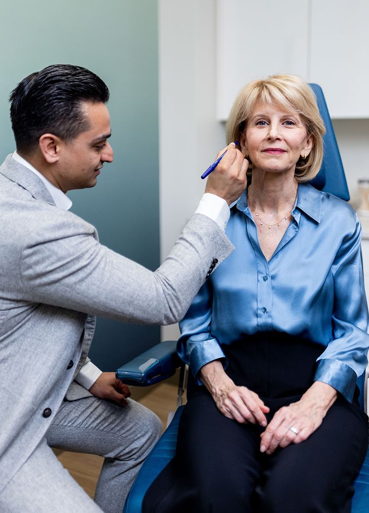 Consultation for cosmetic treatment with patient.