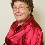 Photo of woman with 50 year old silicone implants