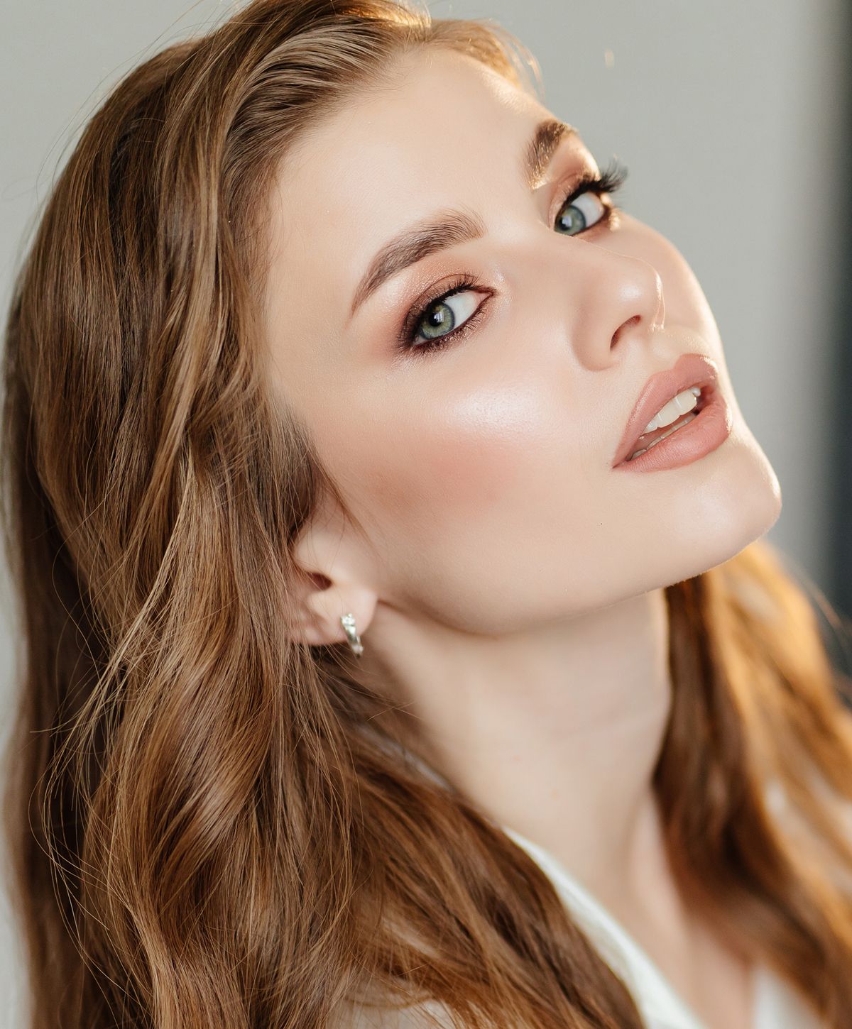 Close-up of a model with light makeup.