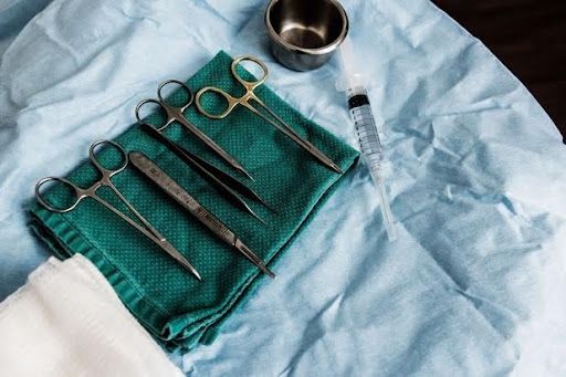 plastic surgery tools on a prep station