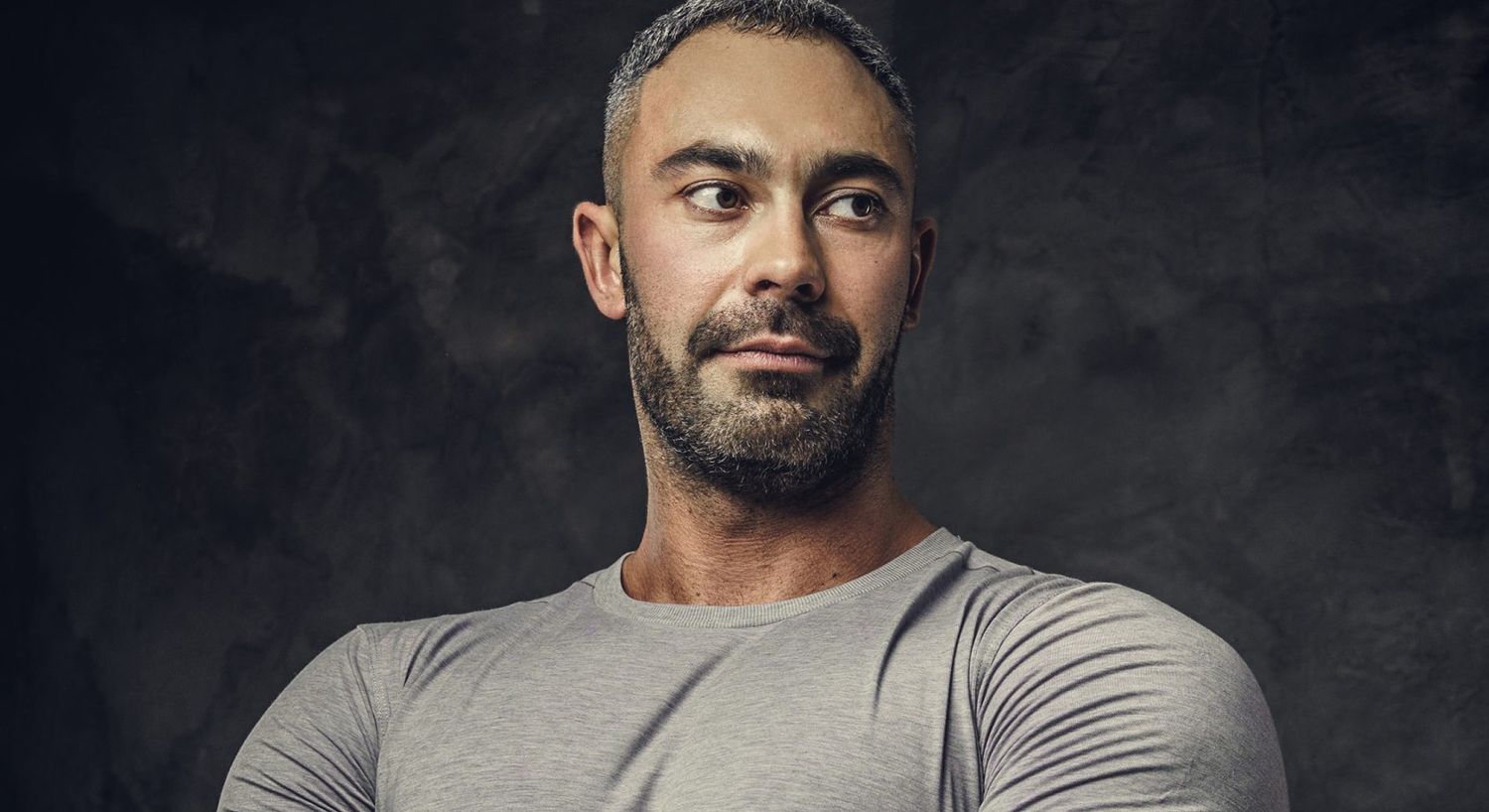 Close-up portrait of a man with beard.