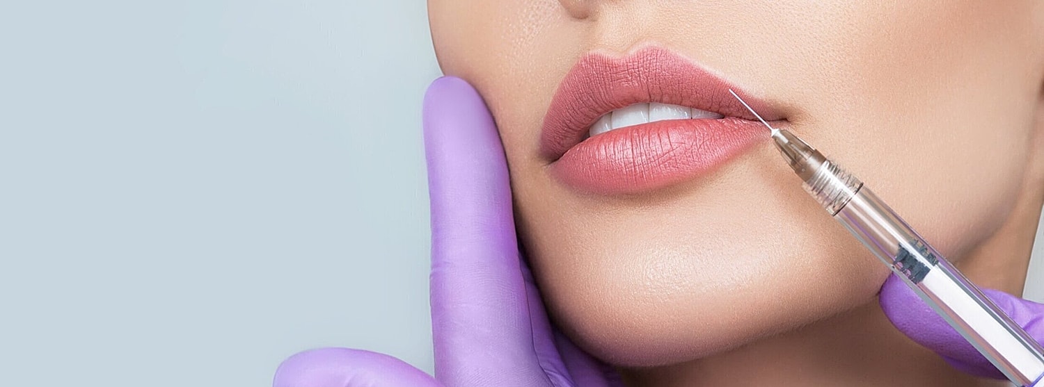 Lip filler patient model receiving an injection