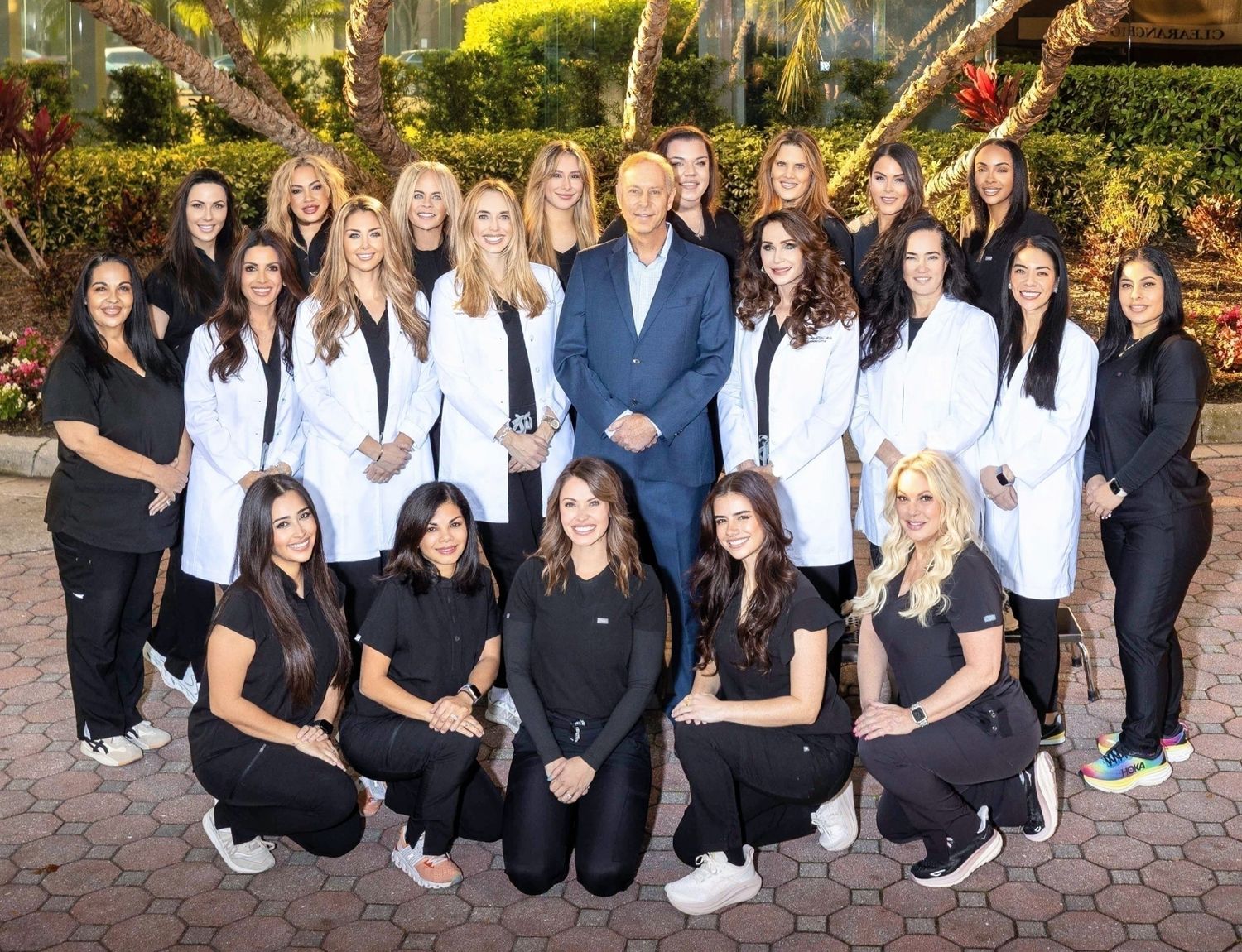 Medical team posing outside together.