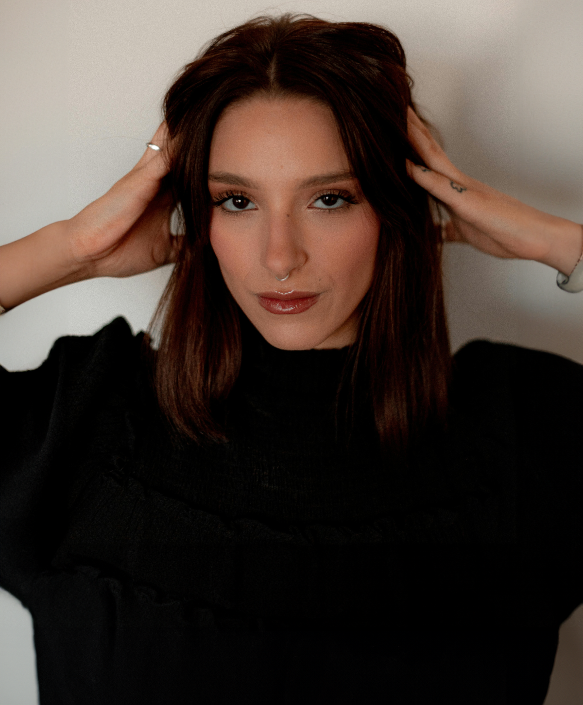 Portrait of an Avon brow lift model with long hair.